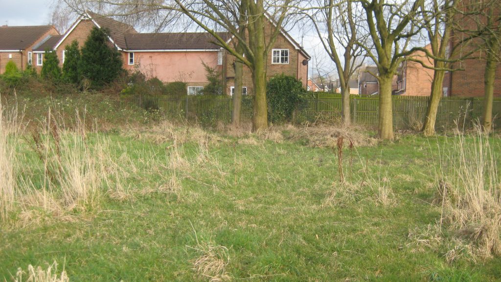 A view of the housing estate that is built on the old St Anne's playing fields. The grassy area may have been part of the fields